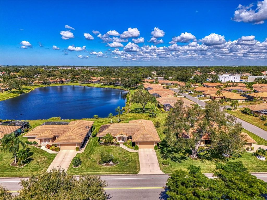 Photo of 3168 E Village Drive, Venice, FL 34293 (MLS # N6141026)