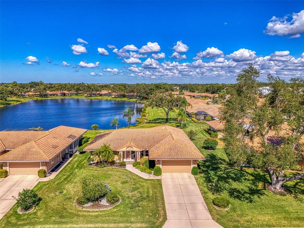 Photo of 3168 E Village Drive, Venice, FL 34293 (MLS # N6141026)