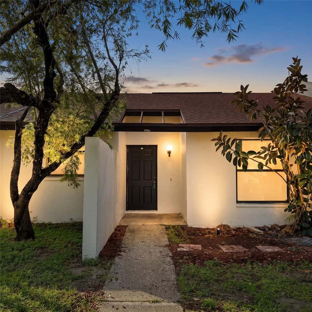 Photo of 11411 Midfield Way, Tampa, FL 33624 (MLS # TB8540510)