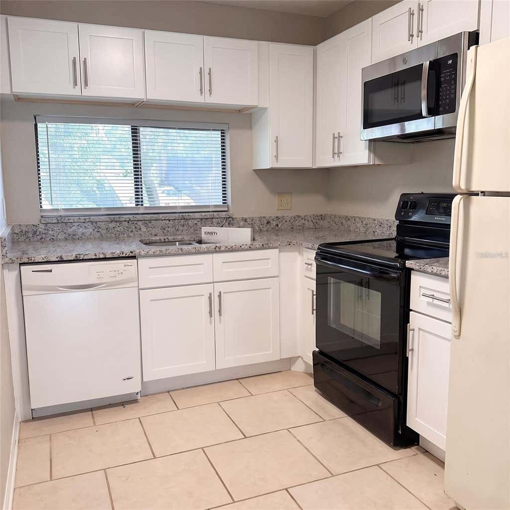 Photo of 11411 Midfield Way, Tampa, FL 33624 (MLS # TB8540510)