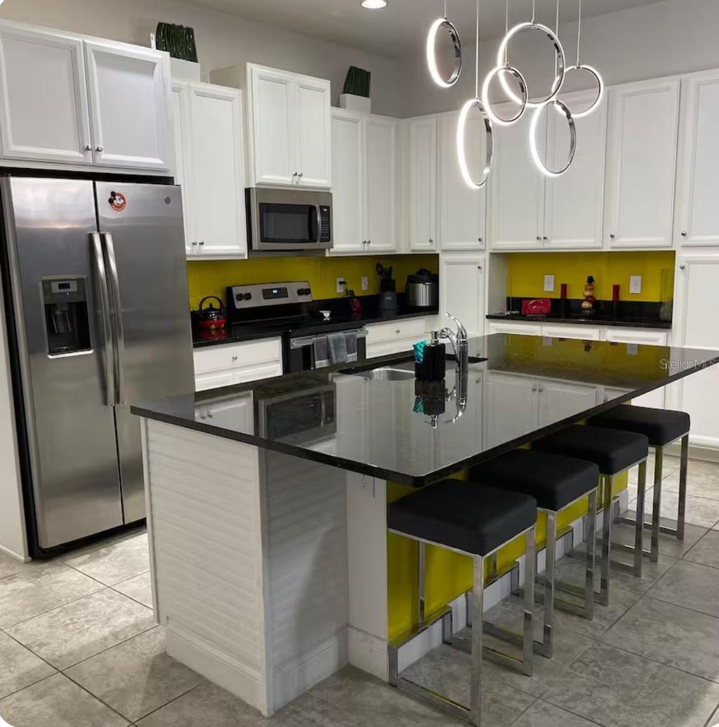 Photo of 130 Captiva Drive, Davenport, FL 33896 (MLS # S5139426)