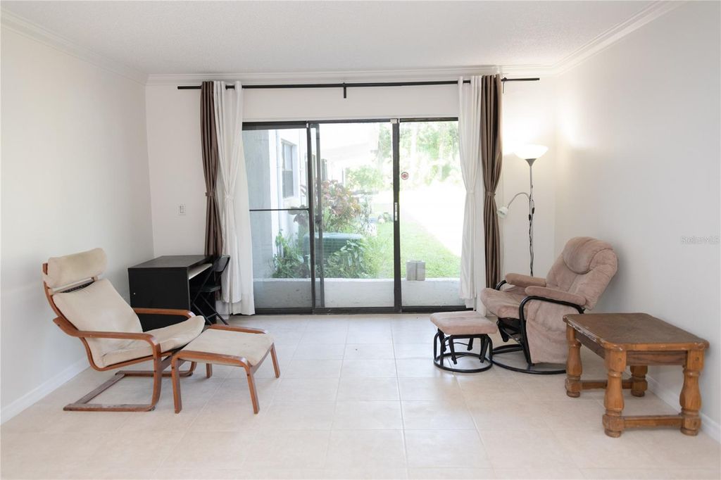 Photo of 1504 Virginia Avenue #105, Daytona Beach, FL 32114 (MLS # O6310155)