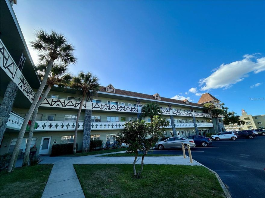 This 2 bed/2 bath, second-floor condo is just a short walk to the East Activity Center. Enjoy easy access to a variety of amenities in this vibrant, interactive community. The kitchen features updated cabinets and extended counters, a stainless steel dual basin sink and ceramic tile flooring.  For your comfort, the HVAC system was replaced in 2023, and ceiling fans in all the main rooms help keep you cool. The 55+ community has two activity centers, and two private golf courses with 9 and 18 holes, exclusively for resident owners and their guests. There are two heated swimming pools. The remodeled Cardio Gym has the latest exercise equipment. A very pet-friendly community, there is a fenced dog park with covered seating. There are hobby studios, and a wood shop for the exclusive use of the residents. Activities include fitness classes, dancing, clubs, cards, billiards, entertainment, classes, and much more. The on-site Good Karma Café has take & bake meals and snacks. Close to beaches, transportation, shopping, entertainment, and fine dining. All room sizes, floor plans and square footage are approximate. This property is being transferred by a leasehold estate deed. Association approval is required. If financing, a 35% down payment is required. Don't miss the chance to make this home your own. Schedule your showing today!