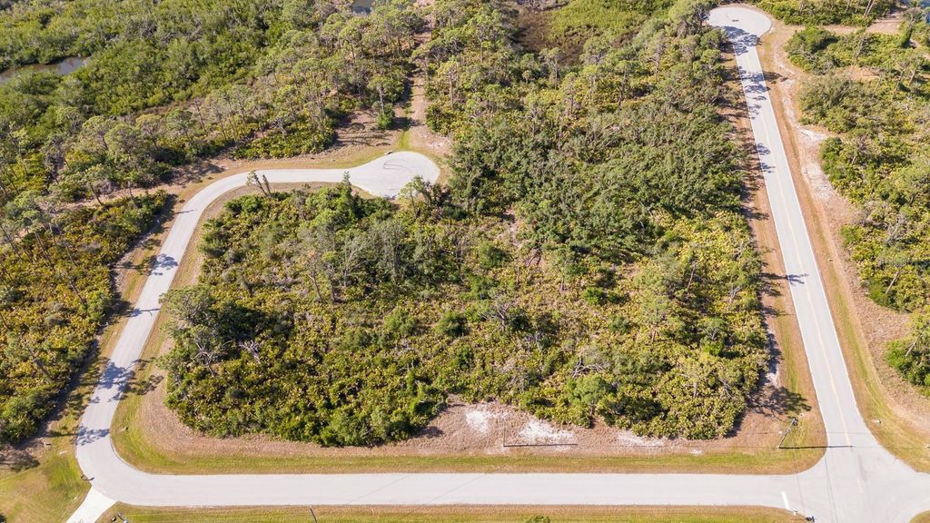 Photo of 123 Flower Road, Rotonda West, FL 33947 (MLS # S5126653)
