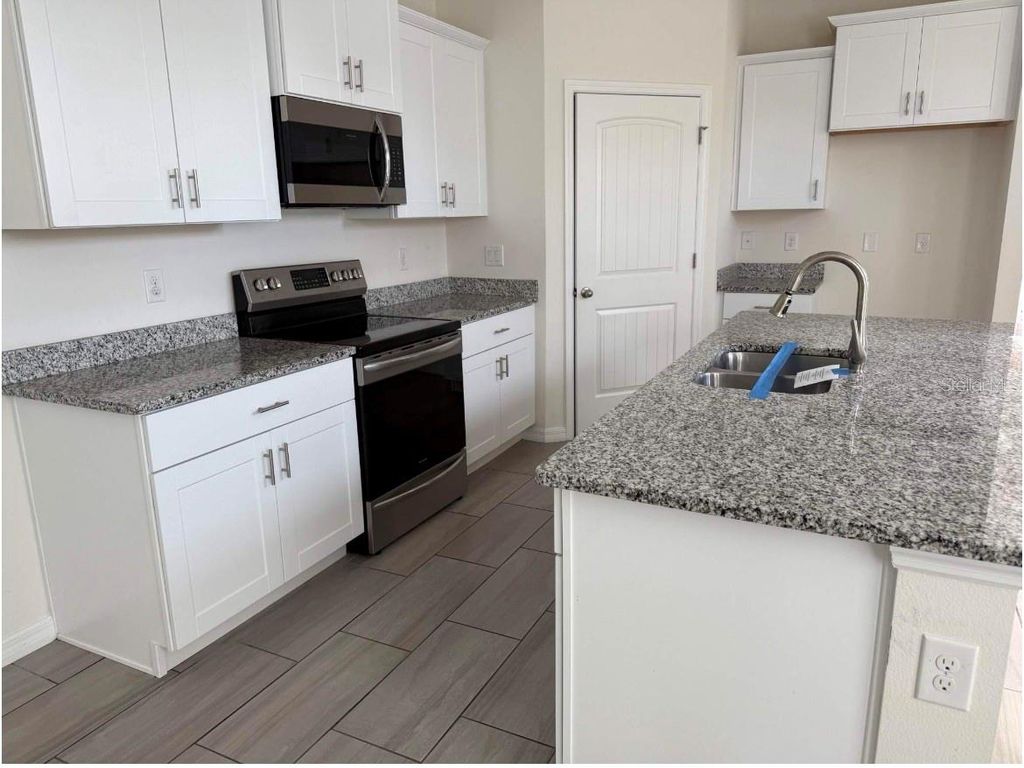 Photo of 9468 Komika Lane, Winter Garden, FL 34787 (MLS # O6382697)