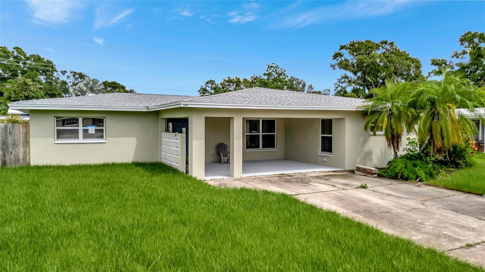 PRIME ST. PETE LOCATION, COMPLETELY REMODELED, Charming, Move-in ready 3 bedroom, 2 bath, POOL with SPA home nestled in a quiet street in a family neighborhood, just minutes to beautiful white sand Gulf beaches, downtown ST Pete shops and restaurants. Nothing has been spared, every detail of this home has been carefully designed and ready for buyers with high expectations. Upon entrance you will fall in love with the wide Open Floor Plan showcasing the Brand New Dream Kitchen which looks like it has been pulled from a HGTV feature. The massive island topped with a gleaming high end Quartz Countertop sits as a focal point, providing the most ideal space for entertaining friends and family. Enjoy the upgraded modern kitchen featuring exquisite cabinetry, finished with an elegant light tone backsplash, and a Brand New Set of Stainless Steel Appliances. Both of the bathrooms have been tastefully remodeled with a modern touch, gorgeous tiles throughout and new vanities. Upgraded modern light fixtures elevate the overall aesthetic of the home, making it stand out. The private master suite, thoughtfully set apart from the other bedrooms, offers a spacious retreat complete with double closets, a cozy fireplace with an inviting reading area and its own en-suite bathroom. Washer / Dryer in the mud room. The Fully Fenced Back Yard features a Shed for extra storage needs and huge in-ground POOL with SPA with upgraded patio surrounding perfect for outdoor entertaining. This backyard oasis will be the setting you create lifelong memories with all your friends and family. New Sod and Newly Installed Sprinkler System ensure a fresh, green lawn that is easy to care for. BRAND NEW AC System with 10 transferable warranty on parts and 1 year on labor. Brand NEW ROOF 2025. Two Carport Spaces. Other new upgrades include brand new tile flooring throughout, baseboards, trim, ceiling fans, light fixtures, receptacles and light switches, faucets, toilets, shower heads, plumbing fixtures, supply lines, vanities, sinks, countertops, interior doors, hardware, and a fresh coat of paint inside. Located just minutes from downtown, top-rated restaurants, waterfront parks, and popular attractions, you’ll have easy access to the best shopping, dining, and entertainment in the area. Whether it's a day at the beach, a night out in the city, or a stroll through nearby parks, this location offers something for everyone!