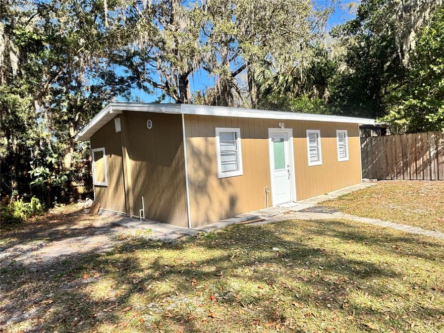 Absolutely gorgeous newly Renovated Debary Cottage! This very thoughtfully designed Contemporary style 1 Bedroom, 1 Bath Tiny home welcomes you with stunningly sleek polished white floors throughout this open and bright living space.  This luxuriously designed kitchen invites you to come home to cook in every night! This is a real gem and owner is seeking a single person or couple to rent long term. This charming home is perfect for a working professional, College Student or Retiree.  This could even be a great 2nd home for snow birds who love our Florida beaches and want a beautiful yet affordable home away from home. This home is currently unfurnished but owner will consider furnishing for the right tenant(s)! Located just 30 mins to the "World's Most Famous Beach" Daytona Beach! If the cool fresh water of the Florida Springs is what you're seeking, Blue Springs State Park entrance and boat ramp to St John's River is just 16 mins away. Disney only 45 mins away. Debary's SunRail Station is just 3 miles away. Easy commute to Deland, Deltona, Daytona, Sanford/Lake Mary for work or Colleges. Call today to schedule your viewing.