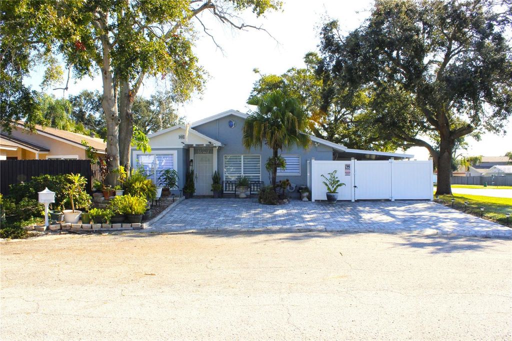 Photo of 10301 Fernglen Place, Tampa, FL 33624 (MLS # TB8440568)