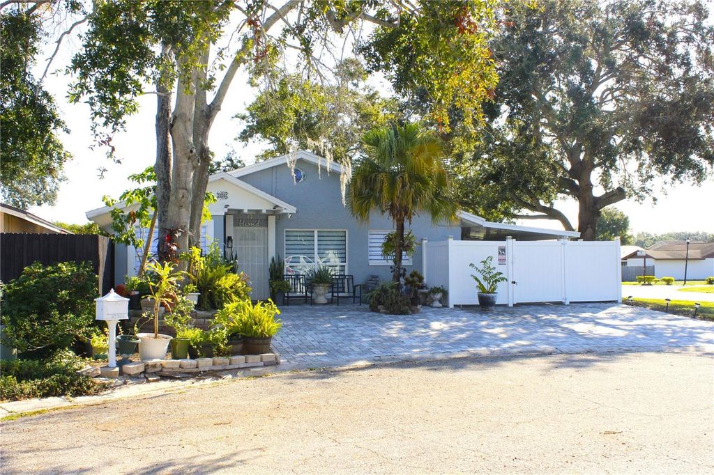 Photo of 10301 Fernglen Place, Tampa, FL 33624 (MLS # TB8440568)
