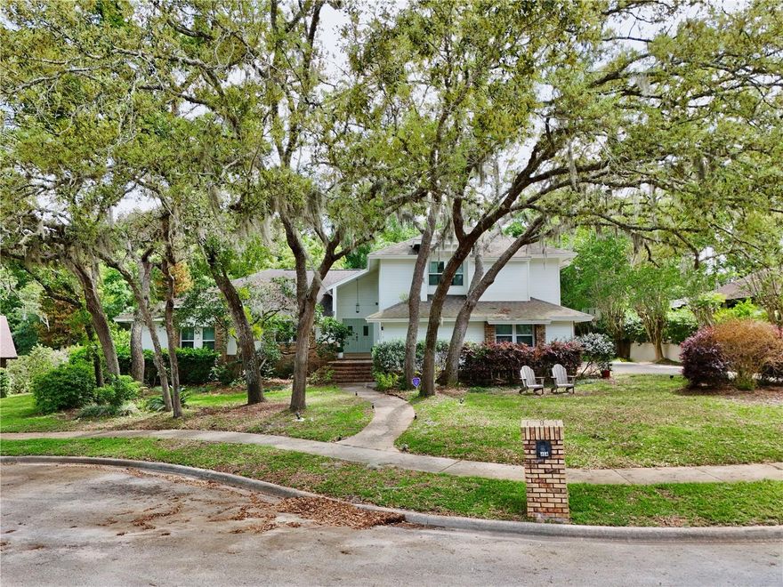 Experience the ultimate Florida lifestyle in this stunning 5-bedroom, 3-bathroom contemporary split-level home in desirable Sweetwater Oaks. Spanning over 3,500 square feet on a quiet cul-de-sac, this residence perfectly blends modern design with functional family living. Entertainer's dream Kitchen & Great Room. The heart of the home is an impressive open-concept kitchen and family room combination featuring soaring vaulted ceilings. Beautiful granite countertops, a central island with a built-in sink and dishwasher, a versatile two-level countertop, and a sun-drenched breakfast nook. The great room showcases a custom stone fireplace with built-in shelving. Three-panel sliding glass pocket doors disappear into the walls, seamlessly merging the interior with the screened-in pool area. Formal Dining & Living. Enjoy vaulted ceilings and multiple expansive windows to enjoy peaceful views of the private pool. The primary suite is privately tucked away on the first level. A versatile 5th bedroom flex space on the main floor serves perfectly as a home office or den. Three additional bedrooms, a full bathroom, and a spacious loft are located on the second floor, providing a dedicated space for family, playroom, or guests. Rest easy with smart outdoor controlled lighting designed for security, holidays, and special events. Beyond your front door, Sweetwater Oaks offers a premier lifestyle with exclusive resident-only access to Lake Brantley at Sweetwater Beach with a beautiful sandy beach for swimming, basketball court, beach volleyball, playground, boat dock, and boat ramp for skiing and fishing. Additionally, residents of Sweetwater Oaks community can enjoy another private access at Riverbend Park. This beautiful expansive park features tennis and basketball courts, baseball and soccer fields, canoeing, and kayaking with access to Wekiva River. Don't miss this rare opportunity to own a piece of paradise in one of Longwood’s most sought-after communities. Schedule your private tour today!