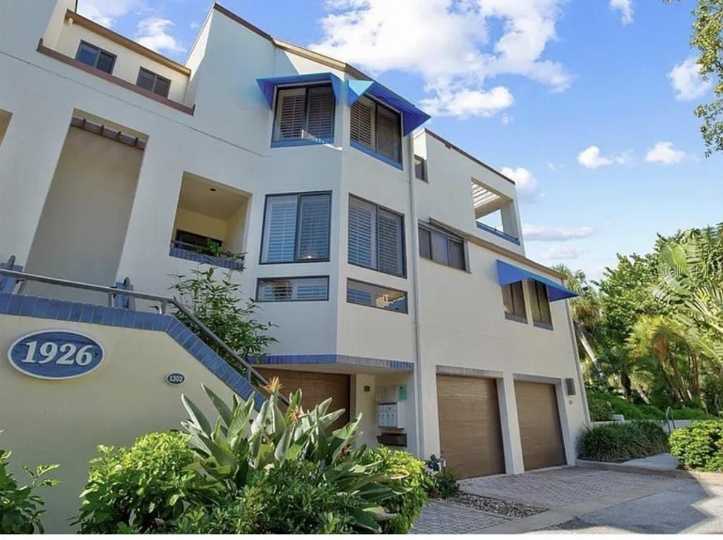 GATED, DEEDED PRIVATE BEACH ACCESS! This is a rare thing to be found on the keys! The main level with plantation shutters and hardwood floors includes the kitchen, dining and living areas. The kitchen has Subzero and Jenn-Air built in stainless steel appliances and granite countertops. A large second story skylight shines natural light through open ceilings onto the main floor dining area. The living area includes a fireplace and provides access to the back screened in lanai. Split bedrooms can be found on the 3rd level of the home. Both bedrooms have ensuite bathrooms and walk in closets. The owners ensuite bathroom includes dual sinks and a shower skylight. A heated pool is only steps away. Take advantage of the gym in the main clubhouse as well as the many amenities offered, including tennis. Membership to the Longboat Key Club is available for the ultimate Longboat Key lifestyle.