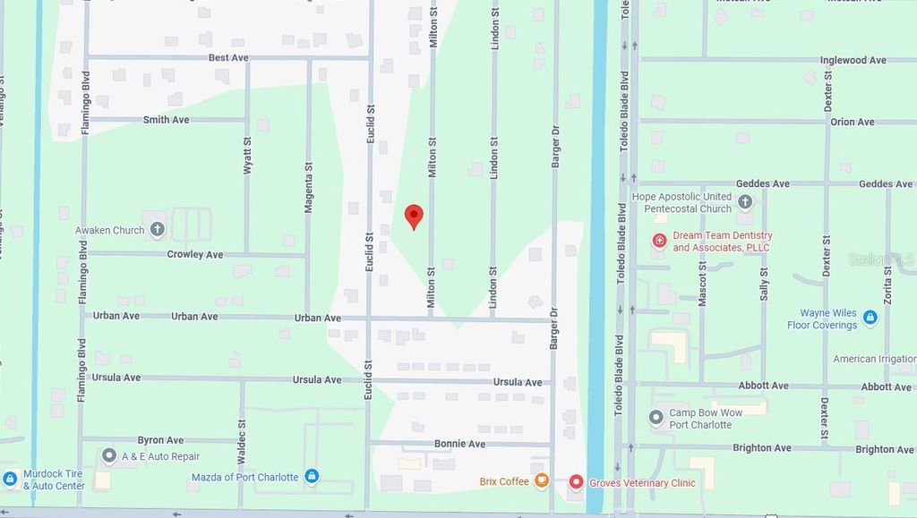 Photo of 387 Milton Street, Port Charlotte, FL 33954 (MLS # C7523355)