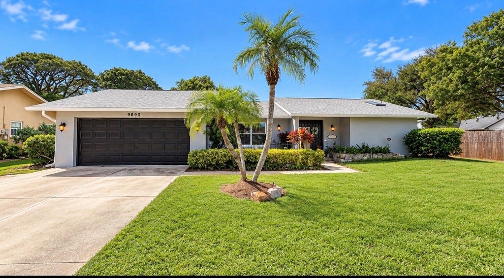 Photo of 9690 Leeward Avenue, Largo, FL 33773 (MLS # TB8561308)