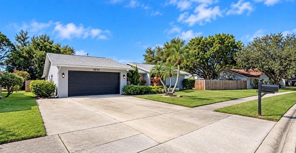 Photo of 9690 Leeward Avenue, Largo, FL 33773 (MLS # TB8561308)