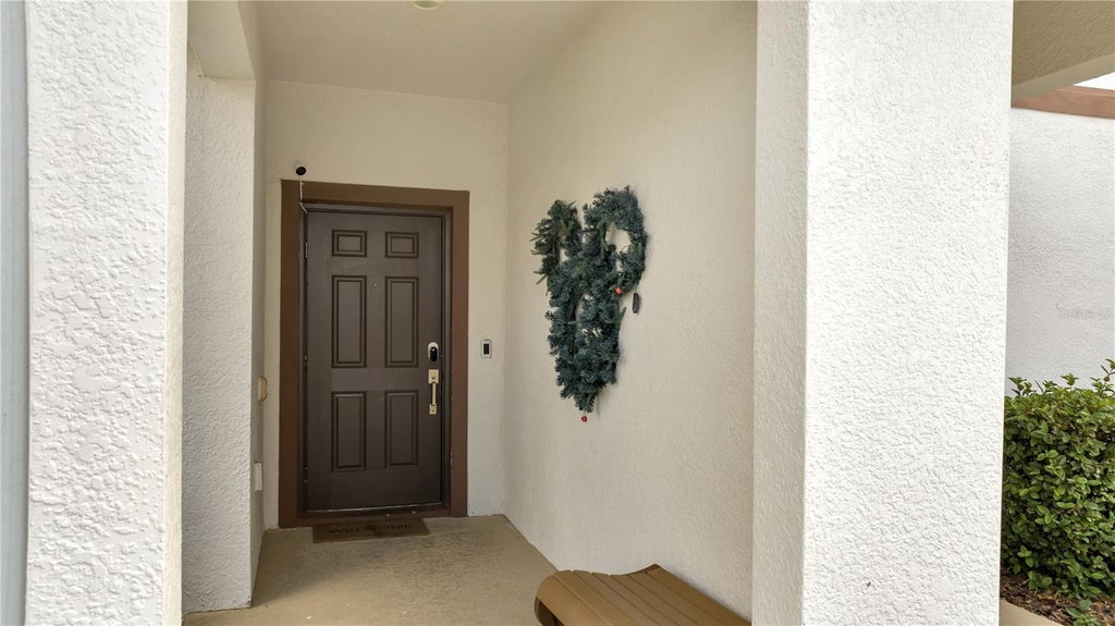 Photo of 1557 Sandbagger Drive, Davenport, FL 33896 (MLS # O6441529)