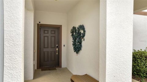 Photo of 1557 Sandbagger Drive, Davenport, FL 33896 (MLS # O6441529)