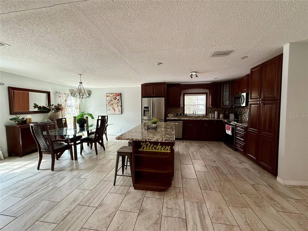 Photo of 914 W Cimmeron Drive, Tampa, FL 33603 (MLS # TB8452199)