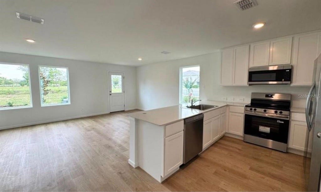 Photo of 962 Phoenix Street, Davenport, FL 33837 (MLS # O6450157)