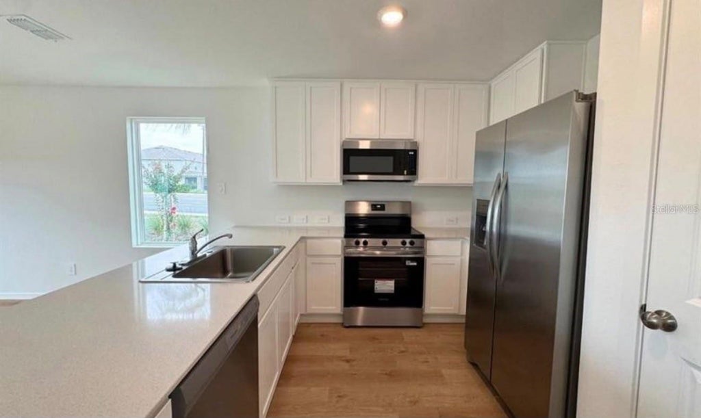 Photo of 962 Phoenix Street, Davenport, FL 33837 (MLS # O6450157)