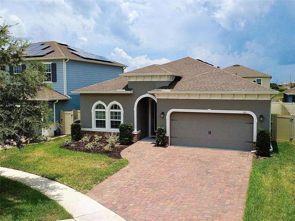 Photo of 584 Seattle Slew Drive, Davenport, FL 33837 (MLS # O6419621)