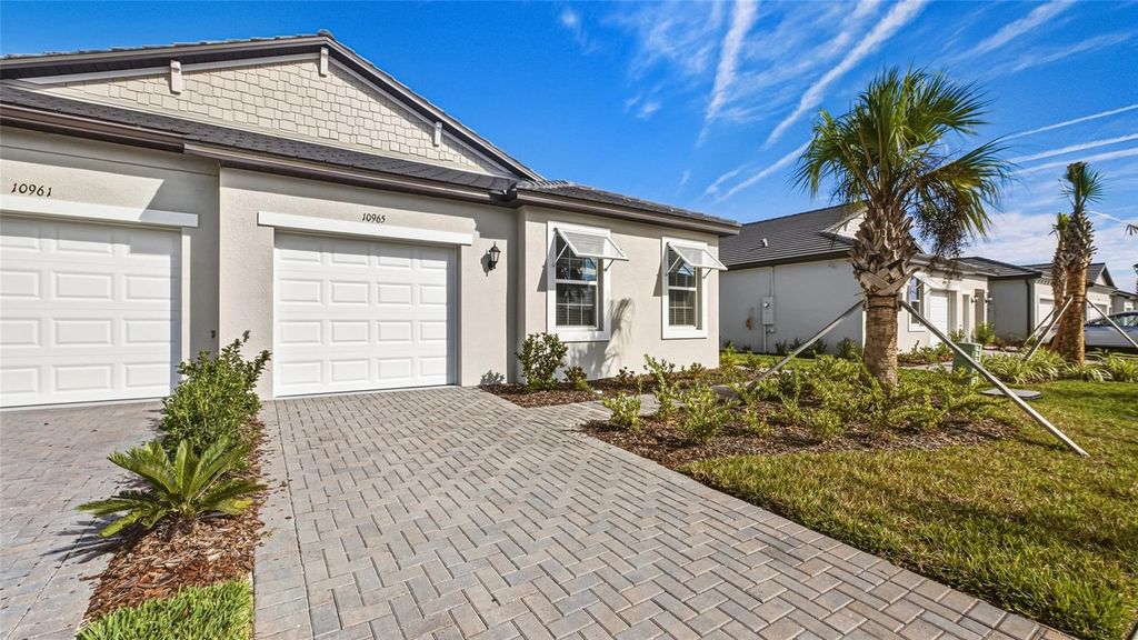 Photo of 10965 Teal Lagoon Isle, San Antonio, FL 33576 (MLS # TB8456402)