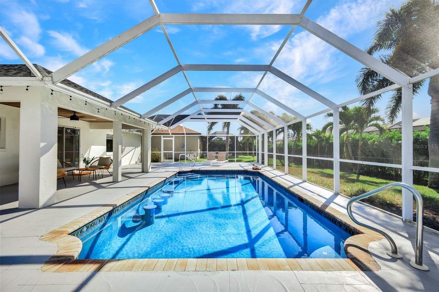 SUPER GORGEOUS MODERNIZED COASTAL BUNGALOW. SOUTH facing, large, heated pool with built in bar stools. Totally fenced in yard with
recently updated irrigation system. NEW: LVP flooring, custom trim work, paint, kitchen, bathrooms, washer and dryer, pantry shelving in
laundry room, furniture, etc. Mechanical updates include a newer roof (2017), AC system (2020), hot water heater (2024) Resurfaced pool
(2020) City water and sewer are connected with assessments paid. Step inside to a bright open layout enhanced by high ceilings and durable
LVP flooring throughout. The kitchen is both practical and attractive, featuring new granite countertops, stainless steel appliances, and ample
cabinet space (even under the bar) The spacious master suite provides a private retreat with its walk-in closet and en-suite bath, and fabulous
view of the sparkling pool! Guest bedrooms are thoughtfully placed on the opposite side of the home for privacy. The garage is beautifully
finished with epoxy flooring and is neat and clean. The huge outdoor lanai was freshly painted around the entire pool. Enjoy meals, and
sunbathing out back while swimming in the luxurious XL pool. Located near all the best schools such as Oasis, Gulf Elementary and Trafalgar.
New sidewalks were just installed along this street. You are a 5 min drive to Starbucks plaza, and all the best shops and restaurants.NO
HURRICANE DAMAGE/FLOODING :)