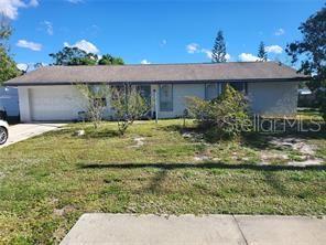 Looking for a home that in in the center of things? This 3 Bedroom 2 Bath home is 2 miles to I75,shopping and 5 miles to the beaches. This home has no HOA and in a going area. This could be your piece of paradise. AC and Hot water heater have been updated, The home sits on lot 1 , lot 2 can be divided.