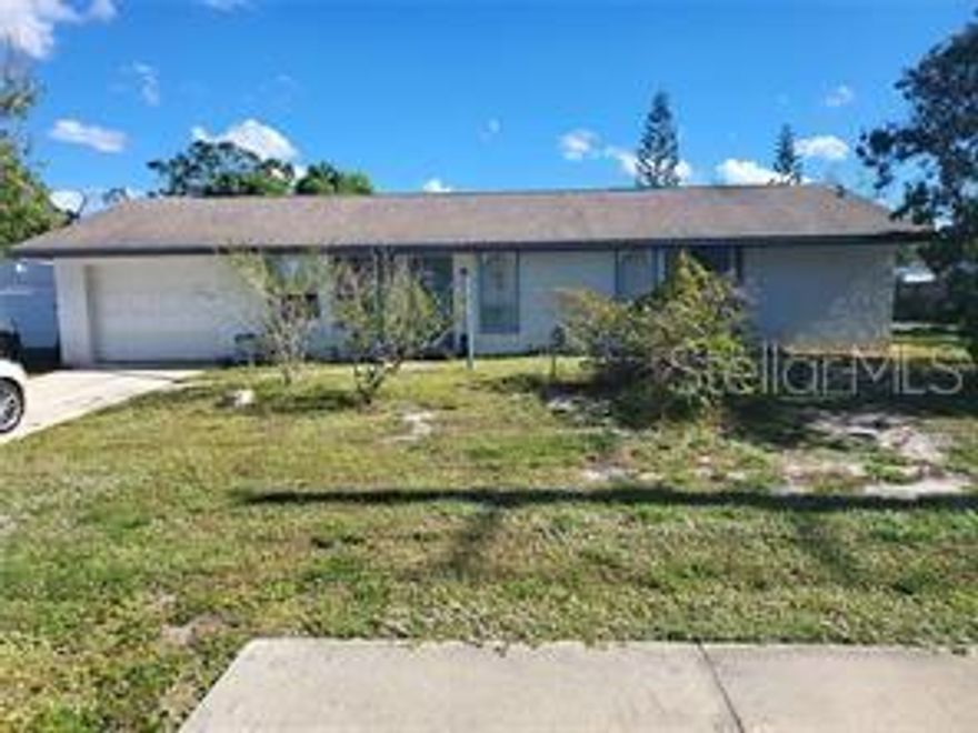 Looking for a home that in in the center of things? This 3 Bedroom 2 Bath home is 2 miles to I75,shopping and 5 miles to the beaches. This home has no HOA and in a going area. This could be your piece of paradise.  AC and Hot water heater have been updated,  The home sits on lot 1 , lot 2 can be divided.