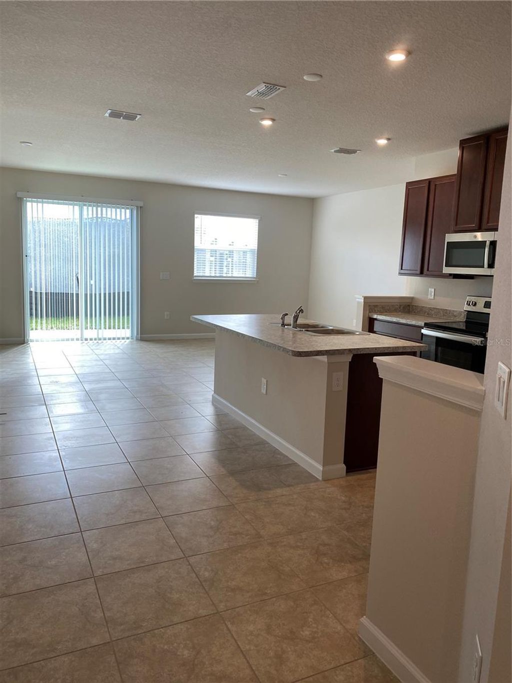 Photo of 2711 Pleasant Cypress Circle, Kissimmee, FL 34741 (MLS # O6375094)