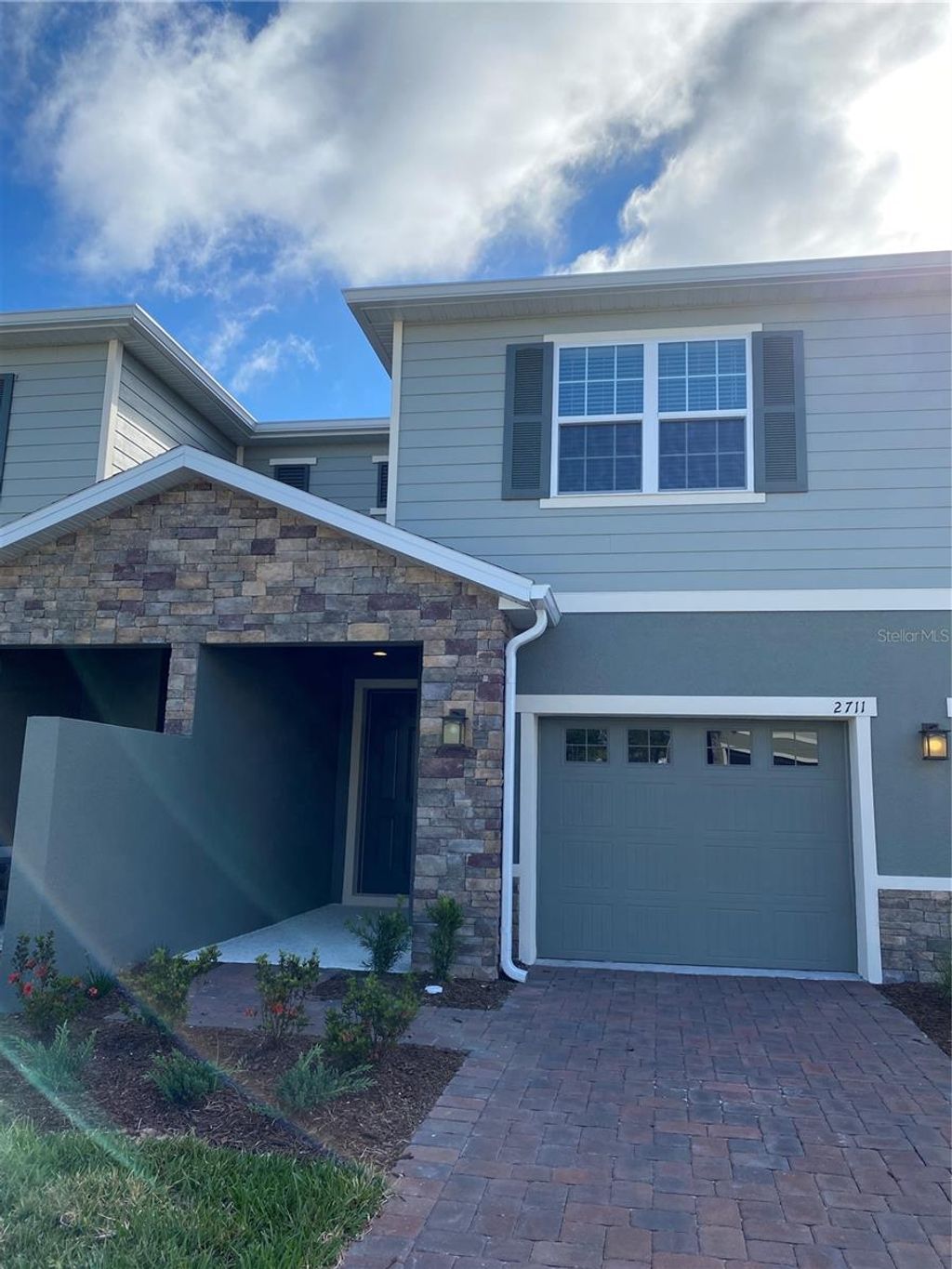 Photo of 2711 Pleasant Cypress Circle, Kissimmee, FL 34741 (MLS # O6375094)