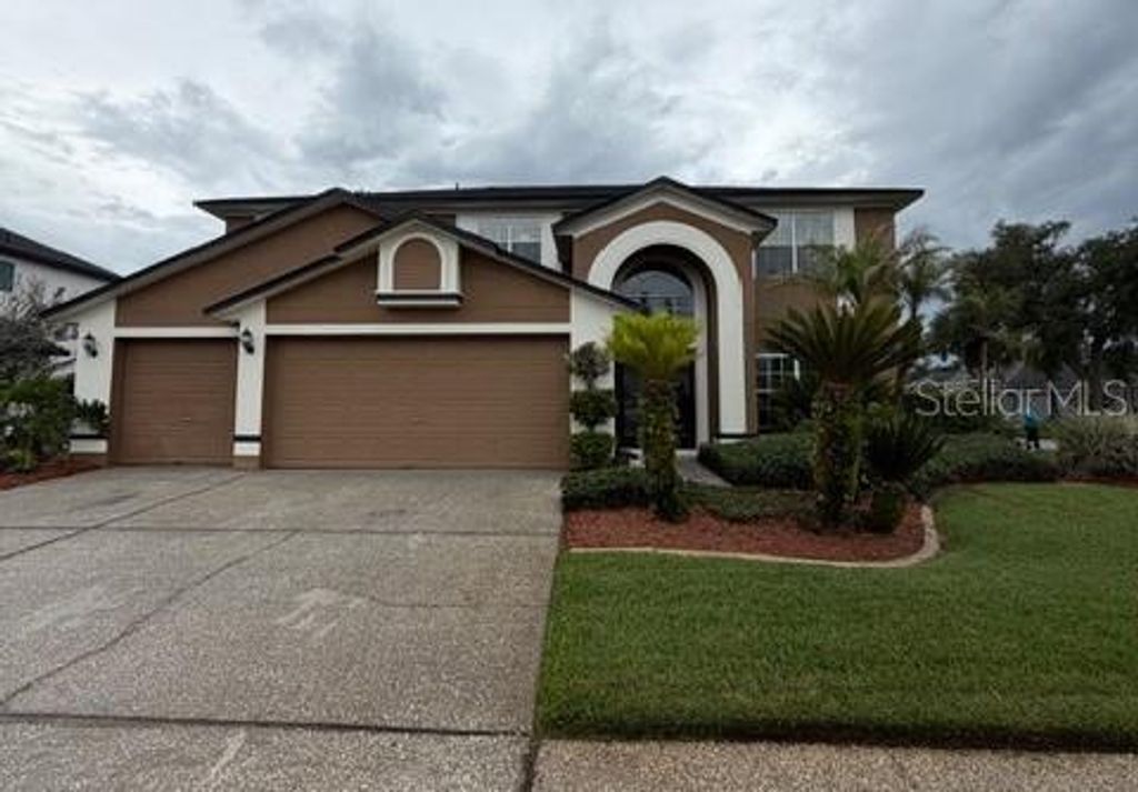 Photo of 1951 Wrenfield Lane, Oviedo, FL 32765 (MLS # O6412706)