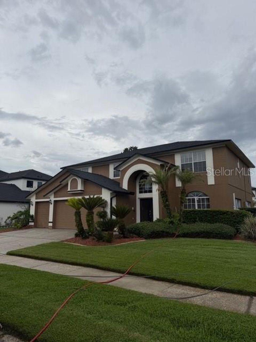 Photo of 1951 Wrenfield Lane, Oviedo, FL 32765 (MLS # O6412706)