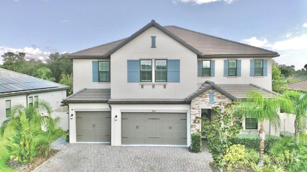 Photo of 19825 Cypress Bridge Drive, Odessa, FL 33556 (MLS # W7889034)