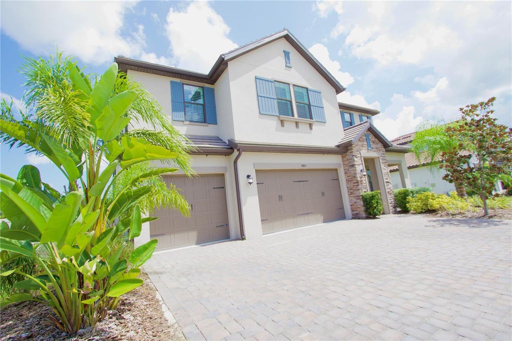 Photo of 19825 Cypress Bridge Drive, Odessa, FL 33556 (MLS # W7889034)