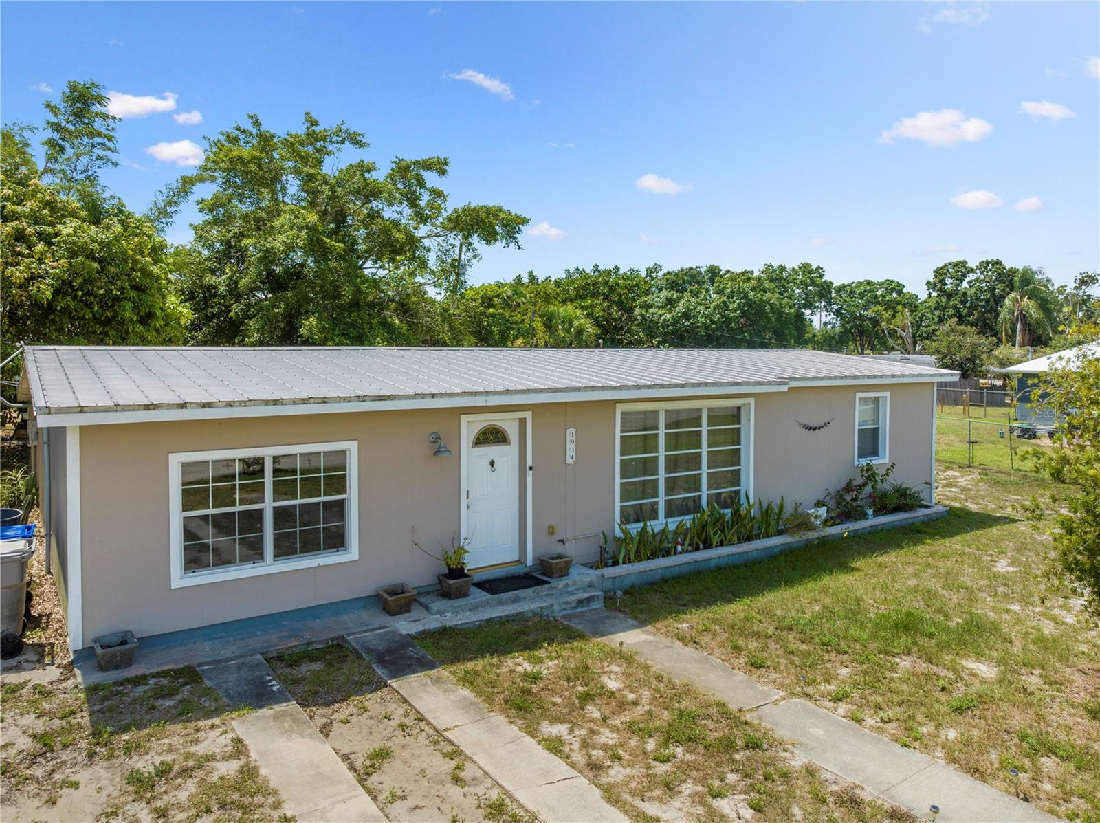 Nestled in the desirable Vero Highlands community, this 3-bedroom, 1.5-bath home sits on an expansive lot filled with mature fruit trees—perfect for outdoor enthusiasts or gardeners. The spacious driveway offers ample parking, and an above-ground pool adds a fun spot to cool off on hot Florida days.
With a flexible layout, this property offers excellent potential for investors—it can easily be converted into a duplex to maximize rental income. Though the roof is older, it’s in good condition with no known issues. There’s currently no central AC, but motivated sellers are willing to contribute toward the installation of a new system, making this an incredible value-add opportunity.
Whether you're looking for your first home or a smart investment, this property offers space, versatility, and plenty of potential. Schedule your showing today—this one won’t last long!