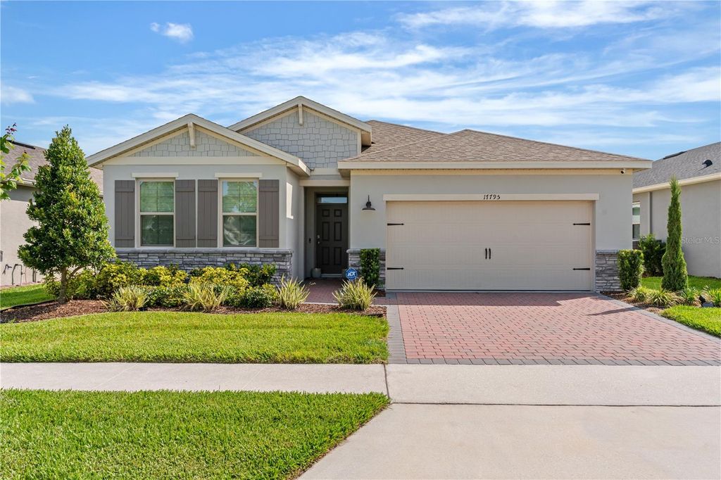 Photo of 17795 Blazing Star Circle, Clermont, FL 34714 (MLS # S5128094)