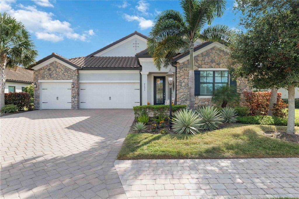 Photo of 7131 Whittlebury Trail, Bradenton, FL 34202 (MLS # A4669647)