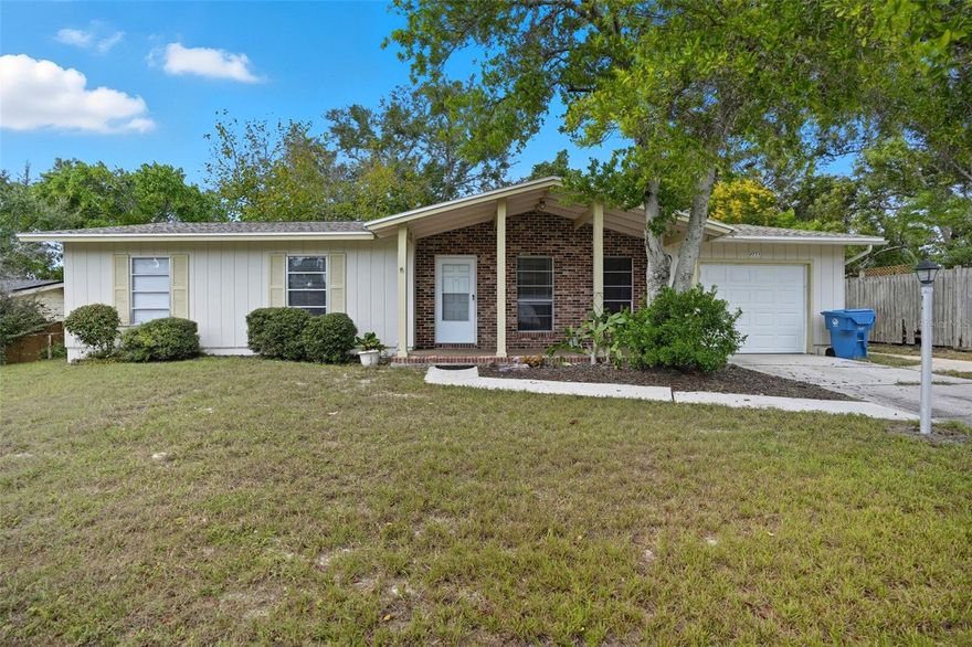 FANTASTIC MOVE IN READY HOME!  Super Convenient Spring Hill Location Only a Short Distance from Shopping, Restaurants, The Gulf of America, The Beautiful Weeki Wachee River, and Other Great Area Conveniences!  Pretty Yard, Nice Front Porch, UPDATED 2024 ROOF, Neutral Tones Inside and Out, Remaining Updated Kitchen Appliances, Plenty of Updated Cabinets / Counter Space, Large Living Room Area, UPDATES TO BOTH BATHROOMS, Tile and Carpeted Flooring, Fantastic Screened Lanai with Ceiling Fan, NEW UPDATED ELECTRIC PANEL COMING SOON, Large Garage, NOT a Flood Zone (X), VERY CLEAN / Neat and Ready for a New Owner!