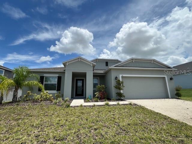 Move-In Ready 3BD/2BA Home in Haines Ridge – No CDD Fees! Skip the wait and start enjoying the benefits of homeownership today with this beautifully maintained 1,856 sq ft, 3-bedroom, 2-bathroom home located in the desirable Haines Ridge Community of Haines City. The exterior boasts charming curb appeal, a spacious extended driveway, and fresh landscaping that welcomes you home. Step inside to discover an open-concept layout that offers both comfort and functionality. The private master suite is thoughtfully tucked away at the back of the home, creating a peaceful retreat from the rest of the living space. The secondary bedrooms are separated by a versatile bonus room—perfect for a home office, playroom, or even a potential fourth bedroom. Enjoy quiet mornings or lively evenings in the covered lanai, ideal for entertaining guests. Open floor plan, well-maintained and move-in ready, convenient location near shopping, dining, and major highways. Schedule your private showing today!