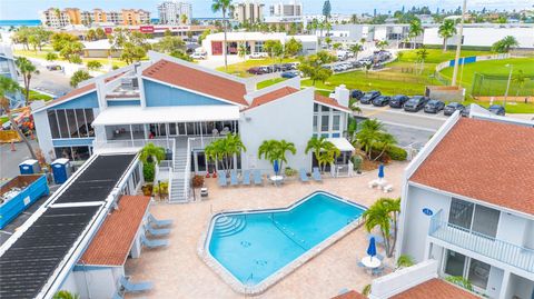 Photo of 230 Medallion Boulevard #E, Madeira Beach, FL 33708 (MLS # TB8513129)