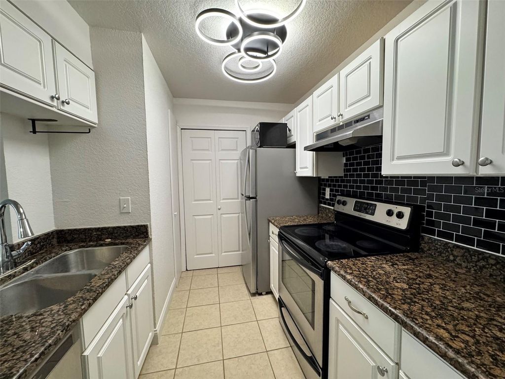Photo of 2550 N Alafaya Trail #4304, Orlando, FL 32826 (MLS # O6387944)