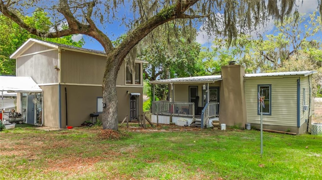 Photo of 15415 SE 64th Place, Ocklawaha, FL 32179 (MLS # TB8496552)