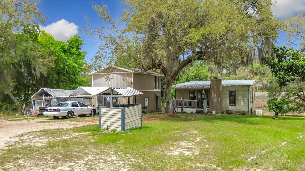 Photo of 15415 SE 64th Place, Ocklawaha, FL 32179 (MLS # TB8496552)