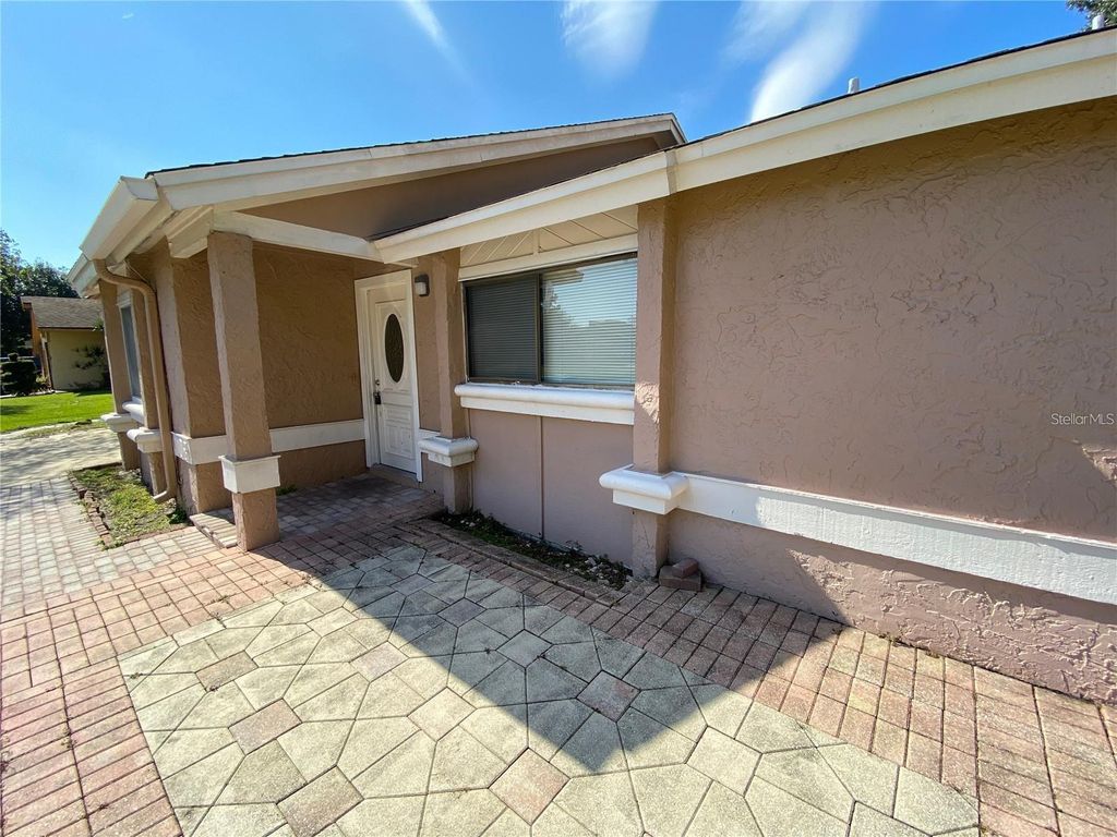Photo of 308 S Shadow Bay Drive, Orlando, FL 32825 (MLS # O6383734)