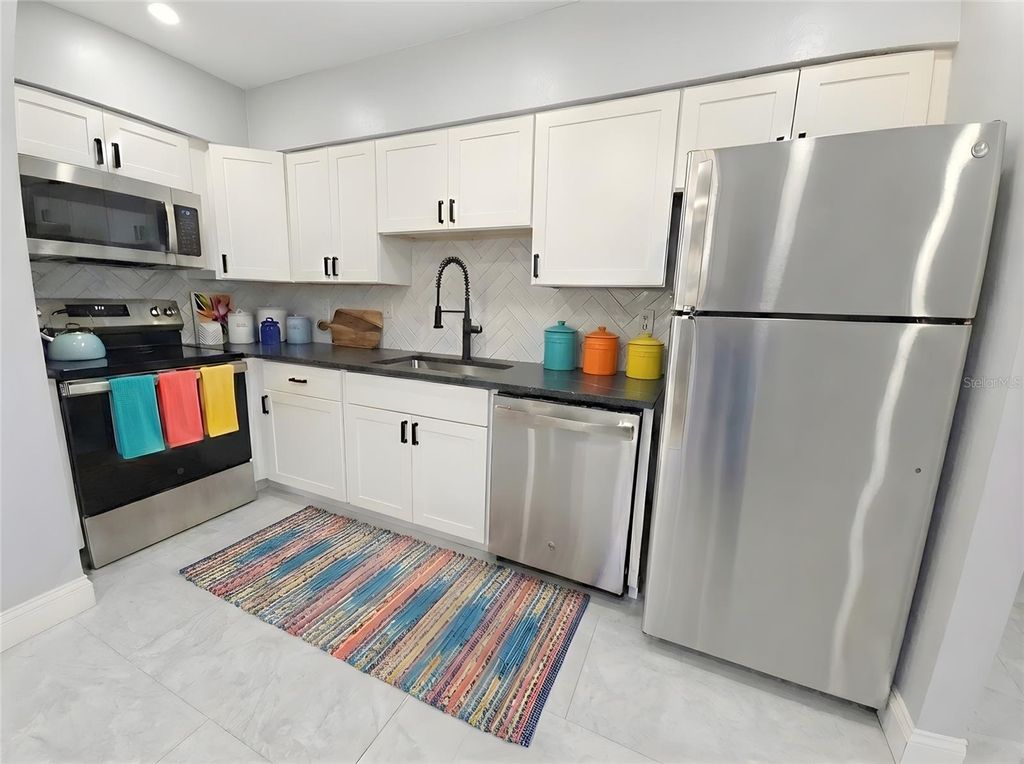 Photo of 2941 Shore Drive #C, Safety Harbor, FL 34695 (MLS # TB8475055)