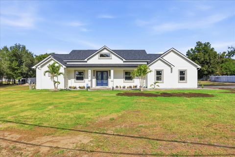 Photo of 4210 Thonotosassa Road, Plant City, FL 33565 (MLS # TB8452330)