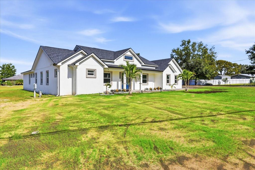 Photo of 4210 Thonotosassa Road, Plant City, FL 33565 (MLS # TB8452330)