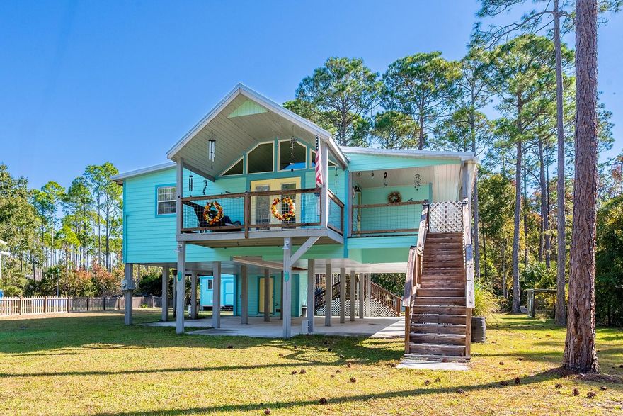 Discover the perfect blend of privacy, nature, and modern comfort in this beautifully remodeled 2 bedroom, 3 bath stilt home located in the peaceful coastal community of Suwannee, FL. Situated on a spacious half-acre lot—larger than most in the area—this property backs directly up to the Lower Suwannee National Wildlife Refuge, ensuring no future development behind you and offering a quiet setting with abundant wildlife right outside your door. Inside, the home features a stylishly updated kitchen complete with granite countertops and high-end appliances, creating an inviting space for cooking and entertaining. The thoughtful layout includes a convenient third bathroom located on the ground floor, making outdoor activities, boating days, or yard work cleanup a breeze. The fully fenced property offers ample outdoor storage with two sheds, a lean-to, and a chicken coop, giving you space for tools, equipment, or hobby animals. A gated entrance adds an extra layer of privacy and security. This unique Suwannee property combines modern upgrades with serene natural surroundings—an ideal retreat for those seeking comfort, space, and the tranquility of nature.