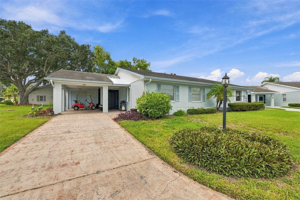 Photo of 427 Gladstone Place #89, Sun City Center, FL 33573 (MLS # TB8552606)