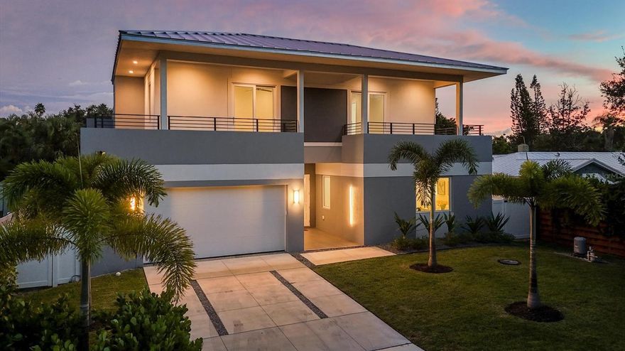 PROFESSIONALLY STAGED! Experience Unmatched Luxury in This Stunning New Residence!
Welcome to this newly built, 2-story masterpiece in the highly coveted Arlington Park neighborhood. This exquisite 4-bedroom, 4-bathroom home spans over 2,692 sq. ft. of impeccable living space, designed for both functionality and unforgettable family gatherings. As you step inside, you’ll be greeted by an open-concept layout with high ceilings and abundant natural light.
The professionally designed kitchen is a chef's dream. It features top-of-the-line Thermador appliances, including a 36” induction cooktop, custom cabinets with soft-pull drawers and soft-close doors, and elegant quartz countertops. This space is perfect for preparing delicious meals for your family and guests. Slide open the 8’ high-impact glass doors to reveal a serene outdoor area, ideal for entertaining or relaxing. The home is adorned with luxurious features, including tiles, fixtures, and cabinets imported from Italy, infusing the space with a touch of European elegance. The peaceful primary bedroom is one of three en-suite bedrooms. It boasts an elegant bathroom with dual vanities, a frosted glass-enclosed water closet, and a spacious Italian walk-in shower. The ample closet space caters to all your storage needs. The second floor houses two additional en-suite bedrooms, each with its own private balcony. Attention to detail is evident throughout this home. A 500-gallon gas generator has been installed for your peace of mind, and a dedicated well maintains the professional landscaping. Conveniently located near the shops and restaurants of Southside Village and just minutes from the vibrant downtown area, Marina Jack, St. Armands Circle, and the renowned Siesta and Lido beaches, this residence offers both luxury and convenience. The Sarasota airport is only 15 minutes away. Don’t miss out on this exceptional property. Call me today to schedule your private showing! DO NOT FORGET TO CLICK ON THE VIRTUAL TOUR! NO FLOOD INSURANCE REQUIRED.